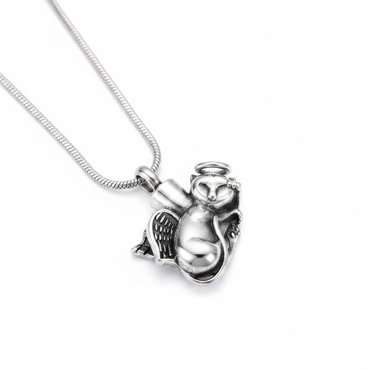 Silver owl-shaped pendant necklace on a dark textured background
