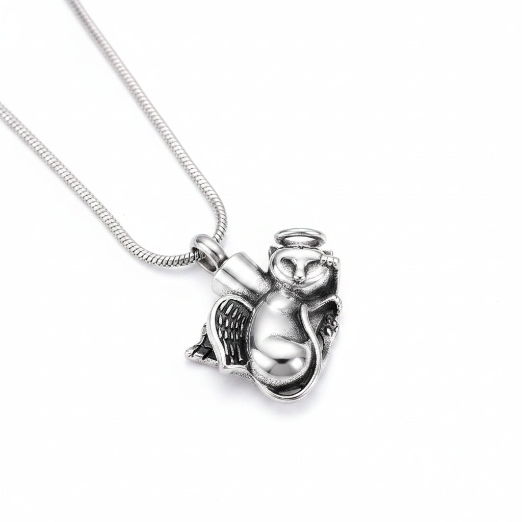 Silver owl-shaped pendant necklace on a dark textured background