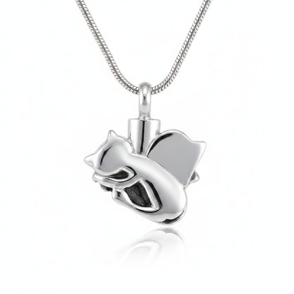 Silver angel pendant necklace on a dark textured surface